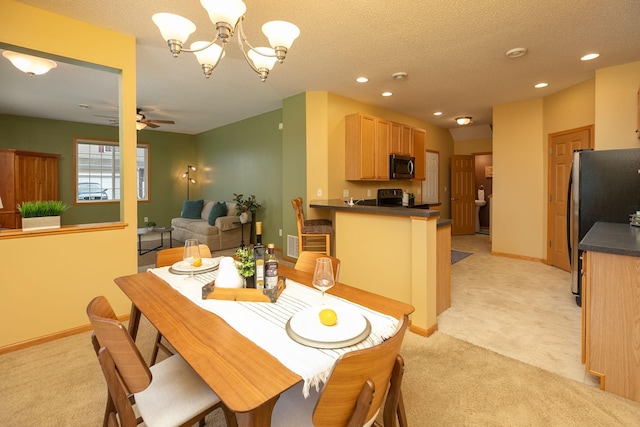dining room featuring recessed lighting, baseboards, light colored carpet, and ceiling fan with notable chandelier