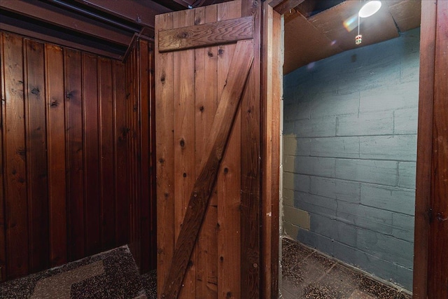 interior space featuring concrete block wall