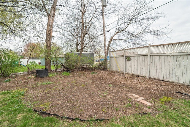 view of yard featuring fence