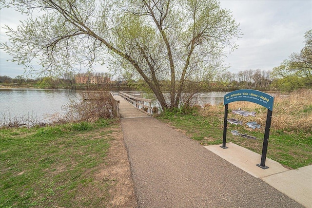 view of home's community featuring a water view