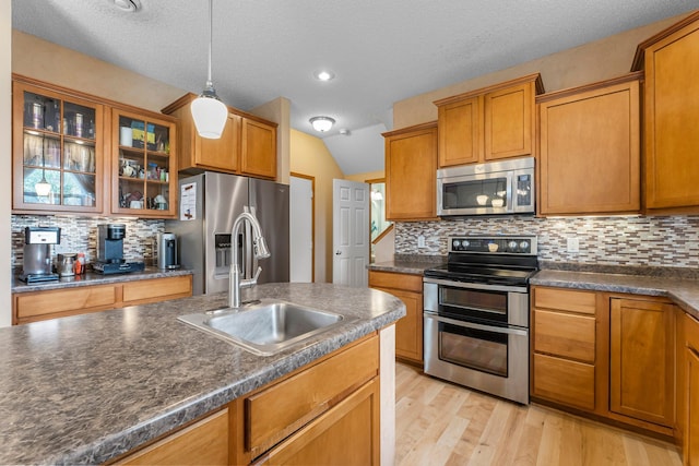1893 13th St W, Hastings, MN 55033 - kitchen with stainless steel appliances, dark countertops, and a sink