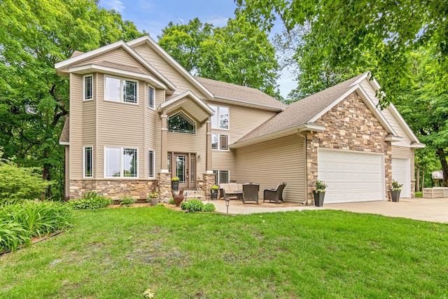 5450 Raven Point Rd, Prior Lake, MN 55372 - view of front of property featuring stone siding, an outdoor living space, concrete driveway, and a front lawn