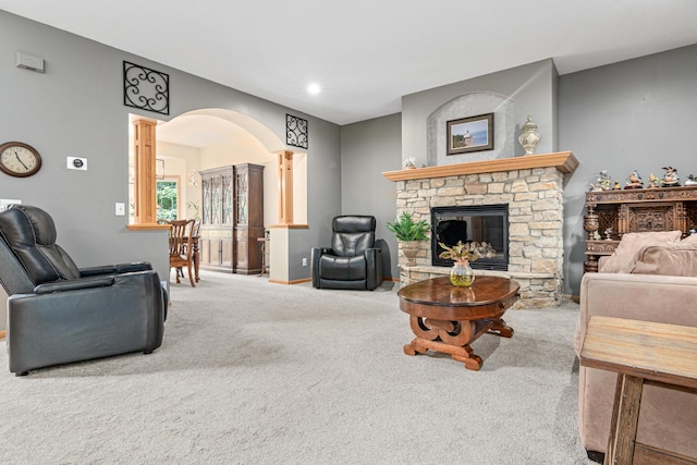 5450 Raven Point Rd, Prior Lake, MN 55372 - living area featuring carpet floors, a stone fireplace, baseboards, and recessed lighting