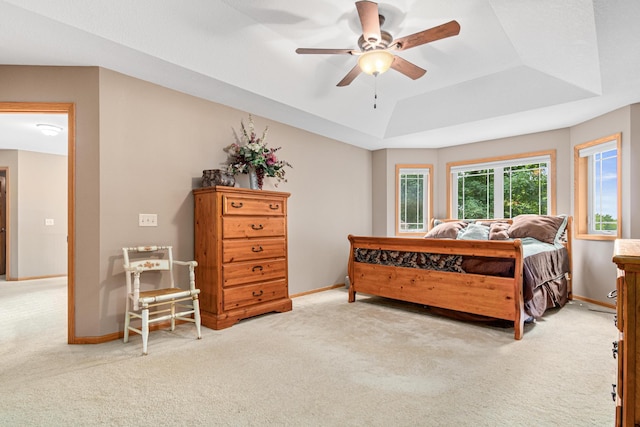 5450 Raven Point Rd, Prior Lake, MN 55372 - bedroom with carpet floors, baseboards, a raised ceiling, and a ceiling fan