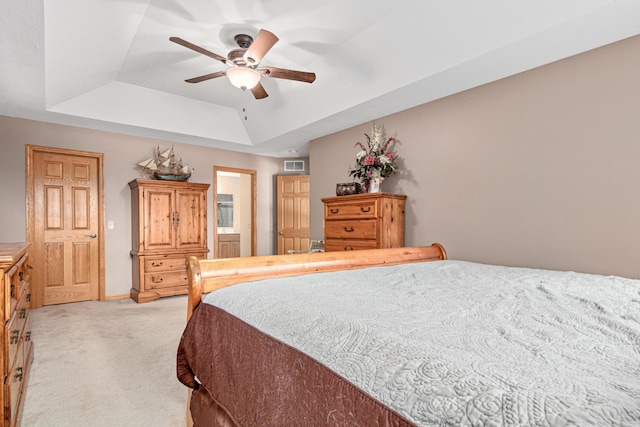 5450 Raven Point Rd, Prior Lake, MN 55372 - bedroom featuring a raised ceiling, light carpet, and ceiling fan