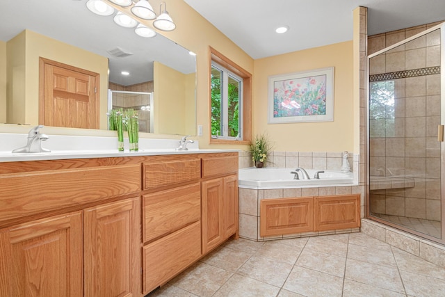 5450 Raven Point Rd, Prior Lake, MN 55372 - bathroom with a stall shower, double vanity, a bath, and tile patterned floors