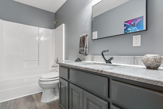 5450 Raven Point Rd, Prior Lake, MN 55372 - bathroom featuring vanity, toilet, wood finished floors, and  shower combination