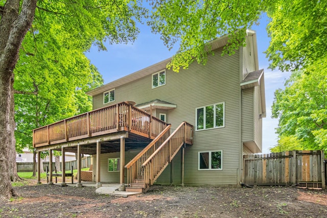 5450 Raven Point Rd, Prior Lake, MN 55372 - back of property featuring a deck and stairway