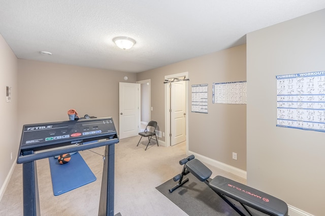 11328 Blazingstar Ln, Lake Elmo, MN 55042 - exercise area with light carpet, baseboards, and a textured ceiling