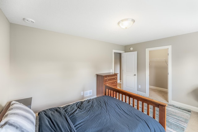 11328 Blazingstar Ln, Lake Elmo, MN 55042 - carpeted bedroom featuring baseboards, a spacious closet, and a closet