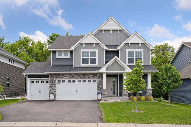 3896 Melby Ave NE, Saint Michael, MN 55376 - craftsman inspired home with driveway, a front lawn, stone siding, and board and batten siding