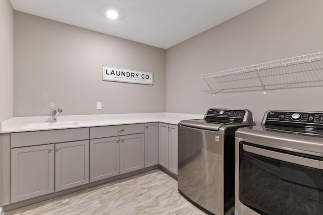 3896 Melby Ave NE, Saint Michael, MN 55376 - laundry area with washing machine and clothes dryer and cabinet space