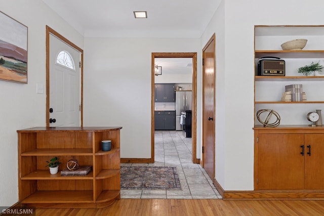 674 Wheelock Pkwy W, Saint Paul, MN 55117 - foyer featuring light wood finished floors