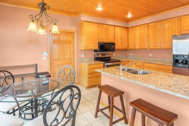 kitchen with a sink, stainless steel appliances, a kitchen breakfast bar, wooden ceiling, and ornamental molding