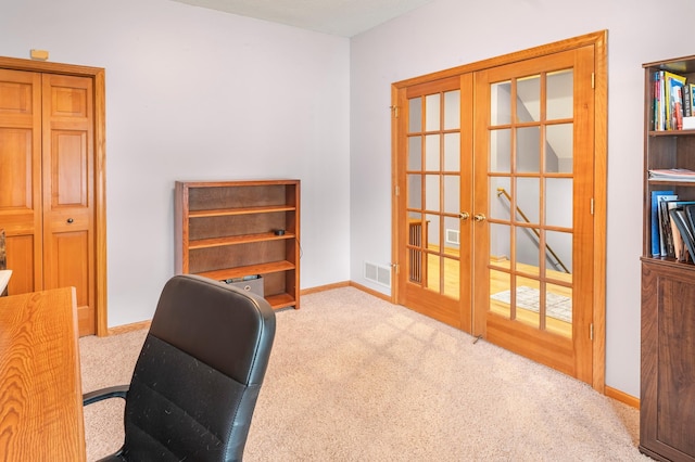 office with carpet, visible vents, french doors, and baseboards