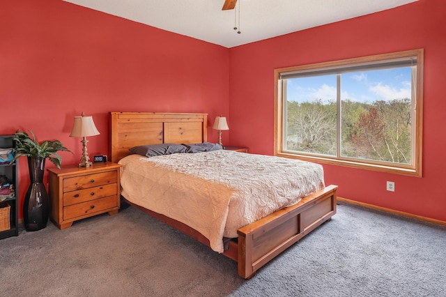 bedroom with baseboards, ceiling fan, and carpet floors