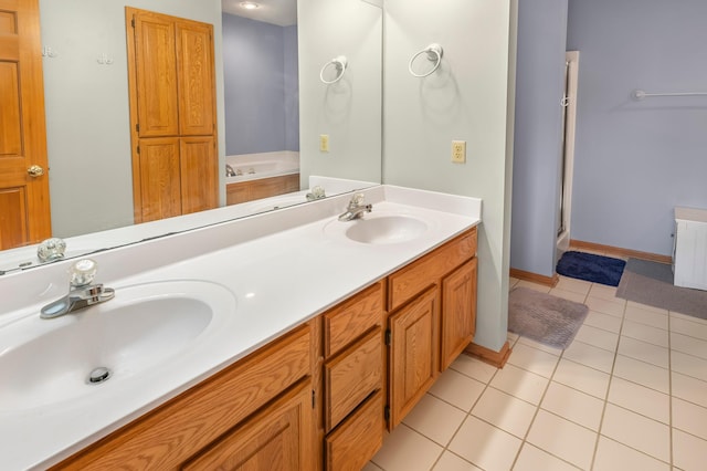 full bathroom with a stall shower, a garden tub, double vanity, and a sink