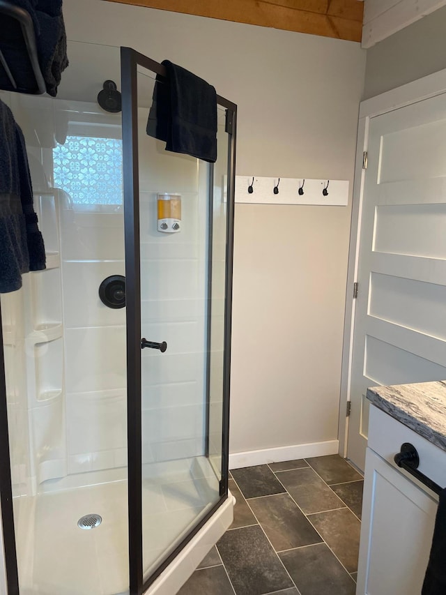 bathroom featuring a shower stall