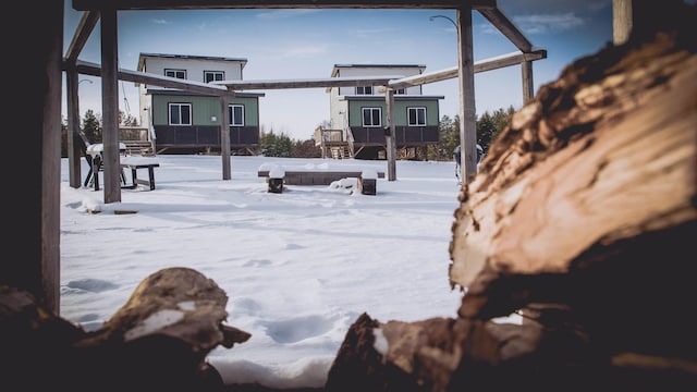 view of yard covered in snow