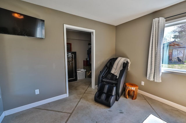 sitting room featuring baseboards