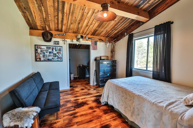 bedroom featuring vaulted ceiling with beams, baseboards, wood finished floors, and wooden ceiling