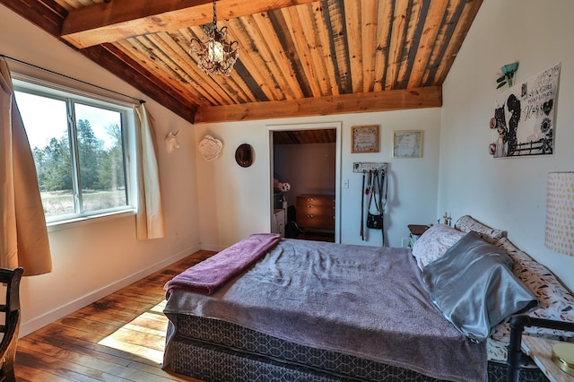bedroom with beam ceiling, a chandelier, baseboards, wood ceiling, and hardwood / wood-style flooring