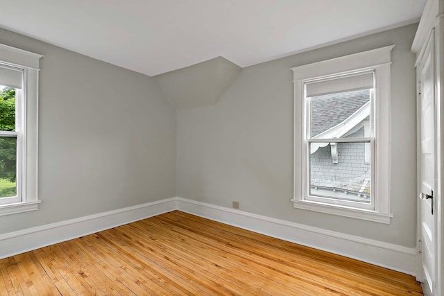 3622 Pleasant Ave, Minneapolis, MN 55409 - additional living space with baseboards and light wood-style floors