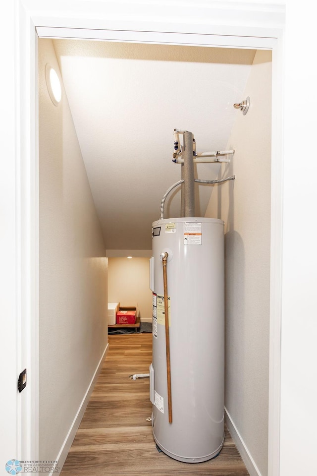 utility room with water heater