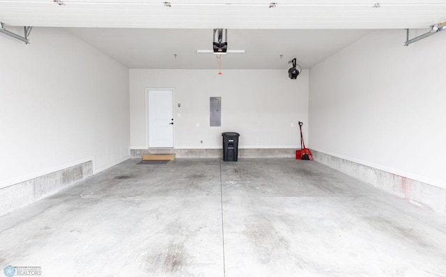 garage featuring a garage door opener and electric panel