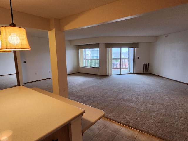 2155 6th Ln SE Unit 301, Cambridge, MN 55008 - unfurnished living room featuring carpet