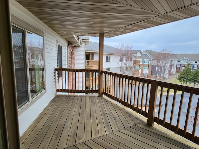 2155 6th Ln SE Unit 301, Cambridge, MN 55008 - wooden deck with a residential view