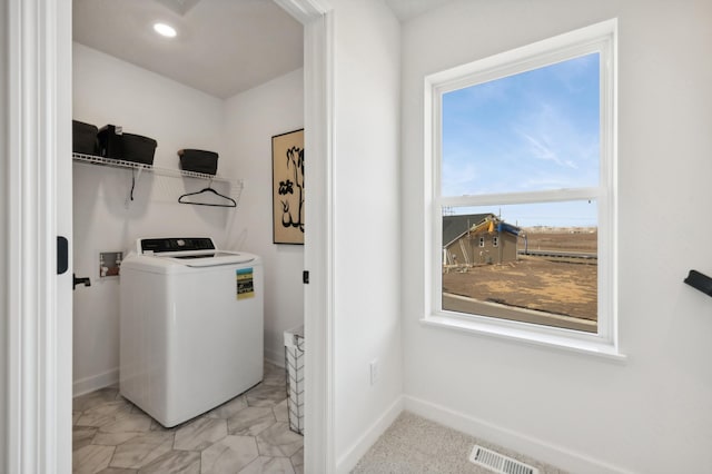 22648 Isla Way, Rogers, MN 55374 - laundry area with washer / clothes dryer and baseboards