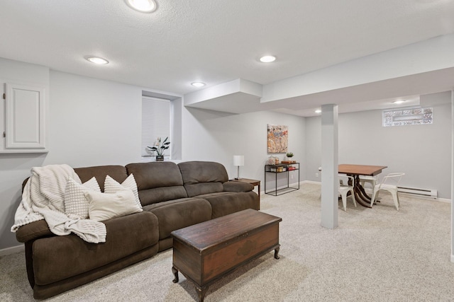 living room featuring baseboards, light carpet, and recessed lighting