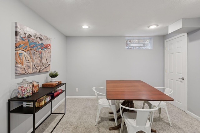dining area with baseboards, recessed lighting, and carpet