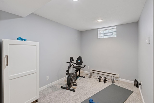 workout area featuring baseboards, a baseboard radiator, carpet flooring, and recessed lighting