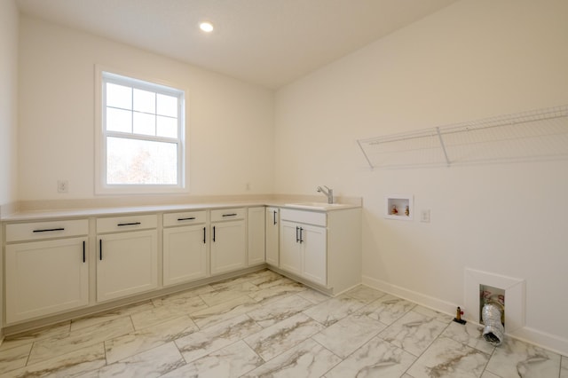laundry area featuring cabinet space, hookup for a washing machine, light marble finish flooring, baseboards, and recessed lighting
