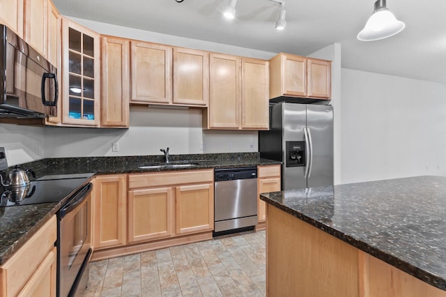 7100 Metro Blvd Unit 116, Edina, MN 55439 - kitchen featuring appliances with stainless steel finishes, a sink, light brown cabinetry, glass insert cabinets, and dark stone counters