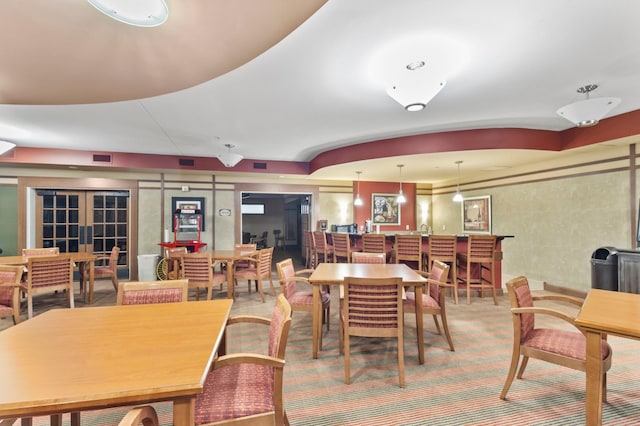 7100 Metro Blvd Unit 116, Edina, MN 55439 - dining room with french doors and carpet floors