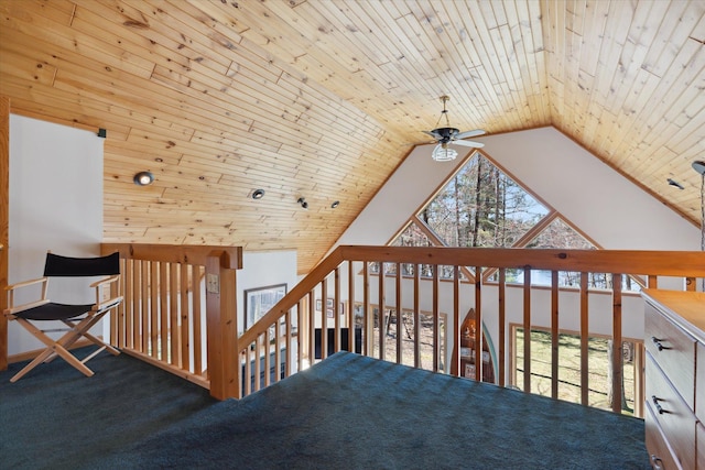 additional living space featuring ceiling fan, healthy amount of natural light, lofted ceiling, and carpet
