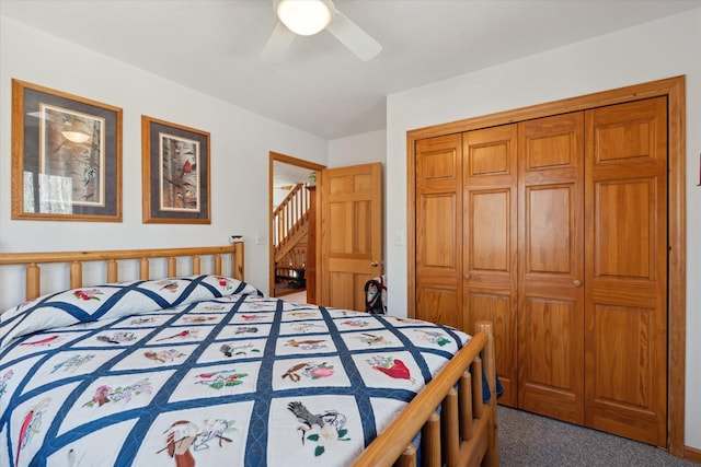 carpeted bedroom with a closet and a ceiling fan