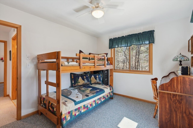 carpeted bedroom with baseboards
