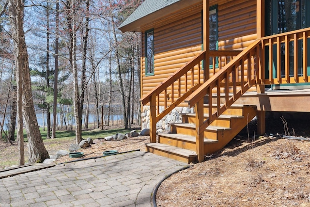 wooden terrace with a water view