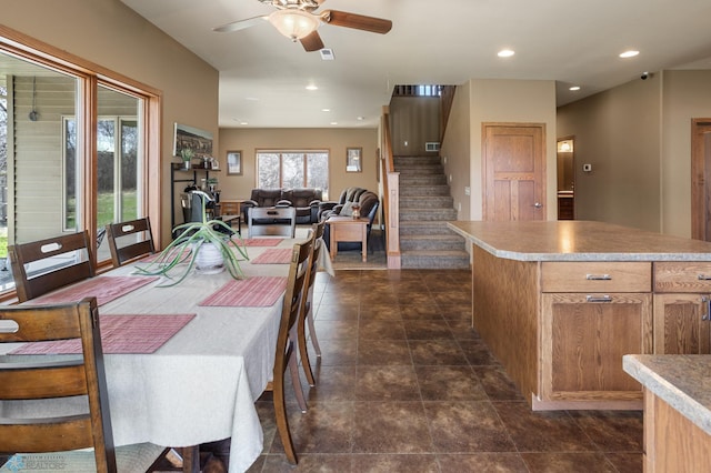 dining room featuring stairway, a ceiling fan, recessed lighting, and visible vents