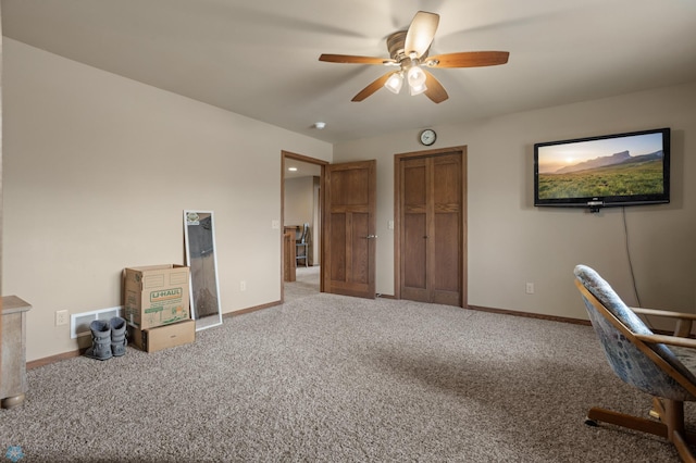 office area featuring visible vents, carpet, ceiling fan, and baseboards