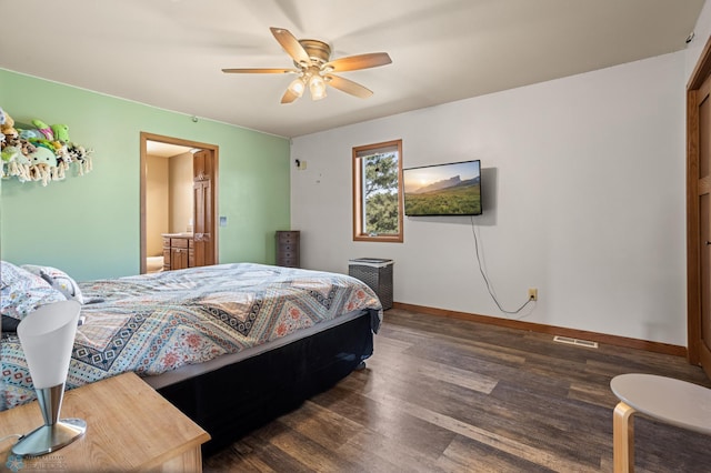 bedroom with visible vents, baseboards, ceiling fan, dark wood-style floors, and connected bathroom