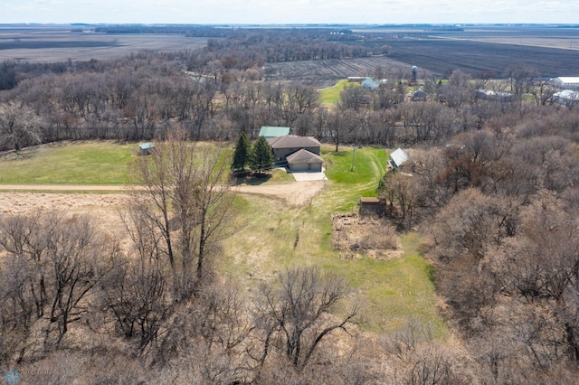 birds eye view of property with a rural view