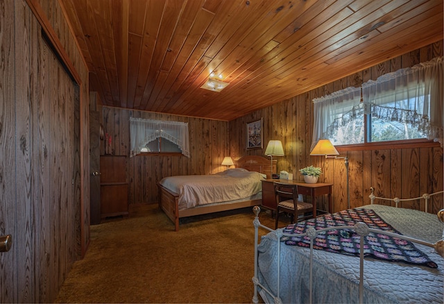 bedroom with carpet flooring, wood ceiling, and wooden walls