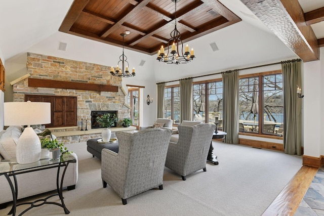 12535 Beach Cir, Eden Prairie, MN 55344 - living area with an inviting chandelier, a stone fireplace, visible vents, wooden ceiling, and beam ceiling