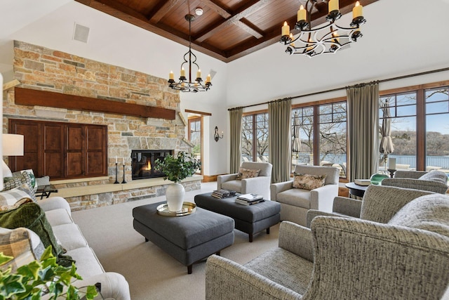 12535 Beach Cir, Eden Prairie, MN 55344 - living room featuring a chandelier, wood ceiling, a fireplace, a high ceiling, and beam ceiling