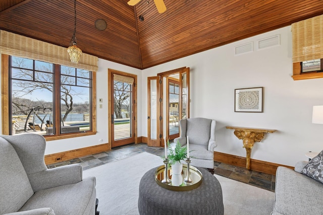 12535 Beach Cir, Eden Prairie, MN 55344 - living area featuring stone tile floors, a towering ceiling, a ceiling fan, baseboards, and wood ceiling
